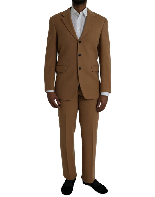 Man wearing a tailored camel brown suit and white shirt at ONJEL Fashion Boutique
